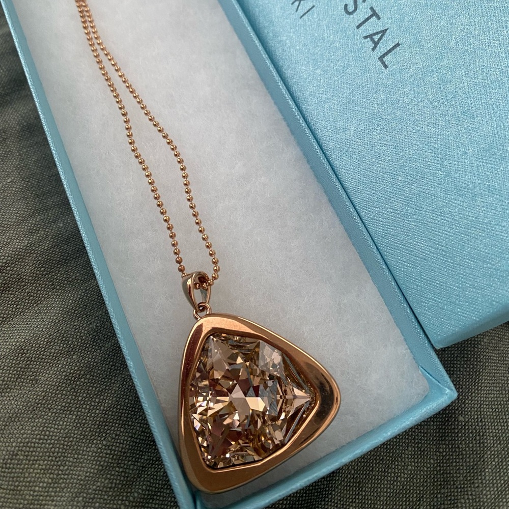 Blush Trilliant Pendant.Rose crystal; rose gold-ion plating; 32" to 35".